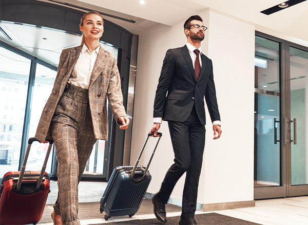 Hotel Experience Post-COVID - couple of business travelers in the airport