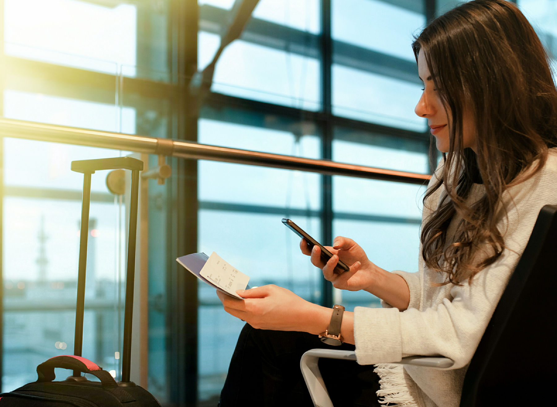 Follow the sun - female business traveler reading CTM's blog
