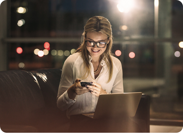 Business traveler looking at laptop
