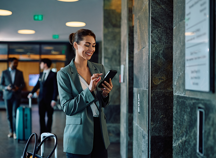Woman in hotel doing review