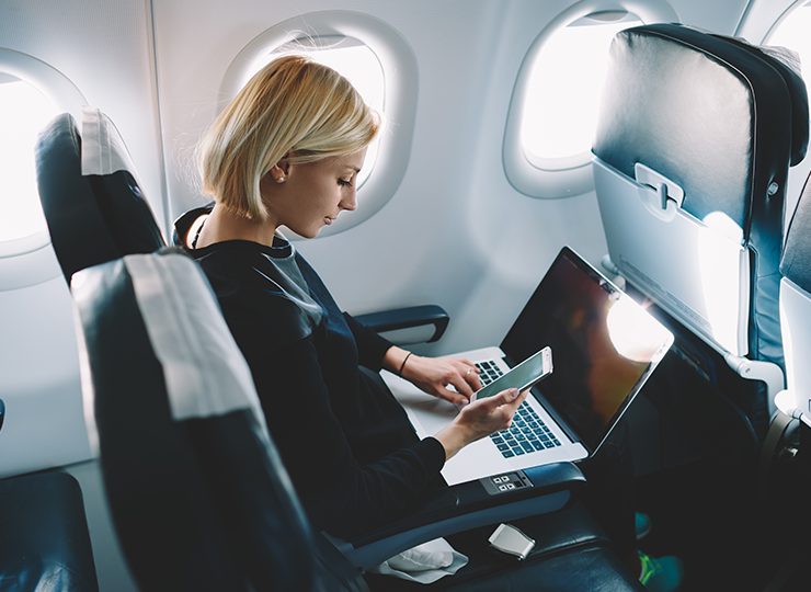 woman reading travel program