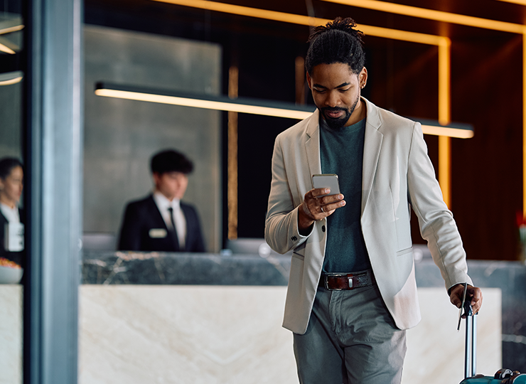 Businessman on cell phone discussing unused ticket savings