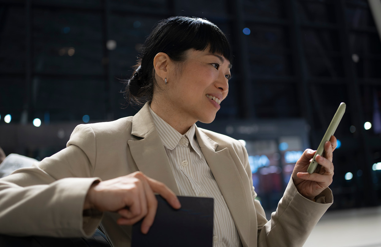 Businesswoman discussing CTM's strategic account travel management solutions